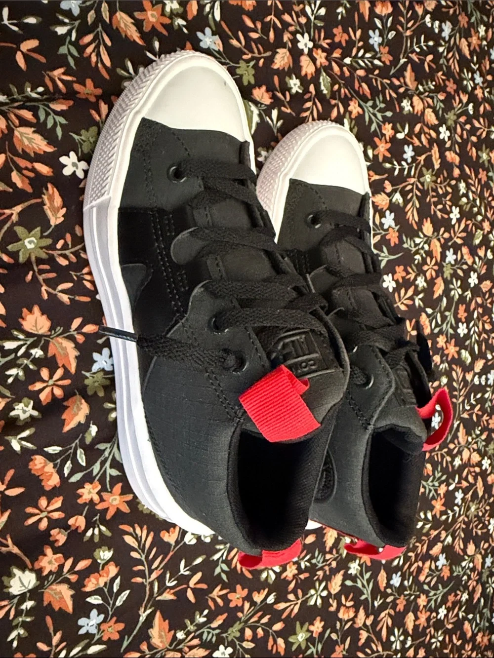 Converse KidsBlack Canvas Low-Top Sneakers with White Toe and Red Pull Tabs